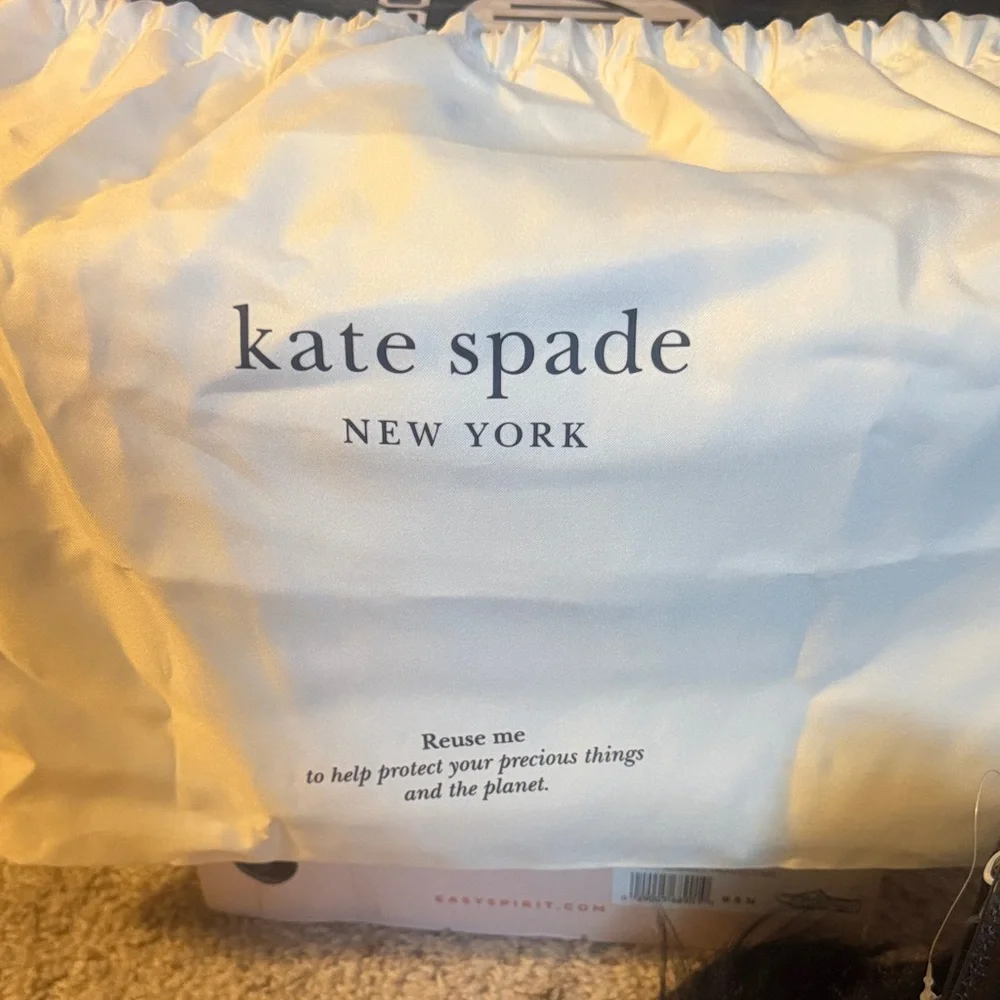 kate spade New York Knott Flap black pebbled leather crossbody with gold chain
